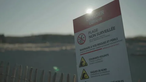 Close-up of danger signs on beach 스톡 동영상 345717697