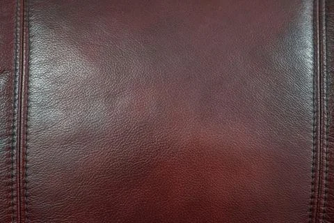 Close up dar red leather texture background Stock Photos