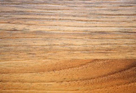 A close-up of a dark aged alder, a flat polished surface of a natural wood. Stock Photos