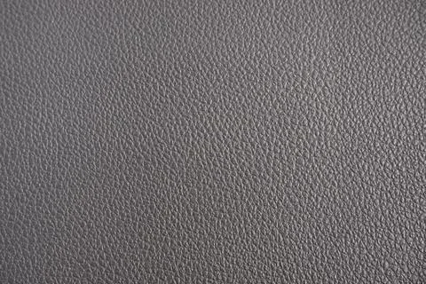 Close up. Dark black leather texture background. Stock Photos