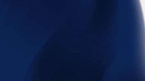 Close up of a dark blue fabric gently waving. Stock Footage 303593083