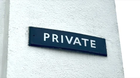 Close up of dark blue private property sign white text and concrete background Vidéo 333172055
