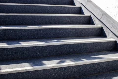 Close Up of Dark Concrete Staircase Steps with Safety Edging Stock Photos
