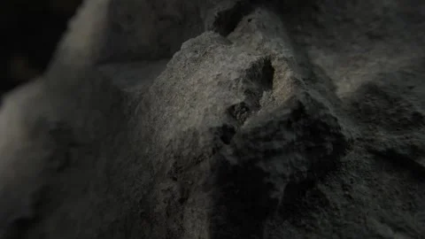 Close-up of dark grey rock with rough, sharp edges Stock Footage 289845548