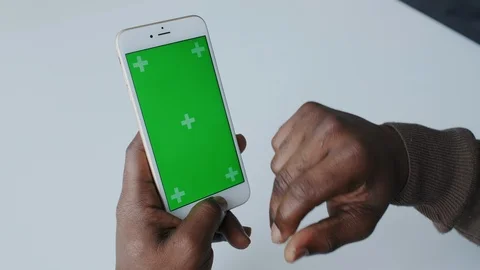 Close Up of Dark Skinned Hands with Green Screen. Colour Chroma Key. Touch Stock Footage 120682285