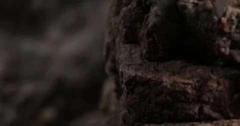 Close-Up of Dark Stone Surface with Rough Texture Stock Footage 287876684