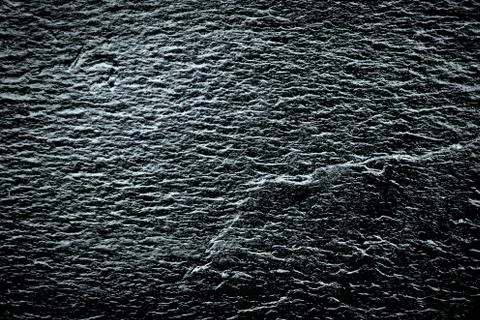 Close up of Dark stone texture use as backdrop Stock Photos