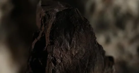 Close-Up of Dark Textured Natural Rock Edge Stock Footage 291268409