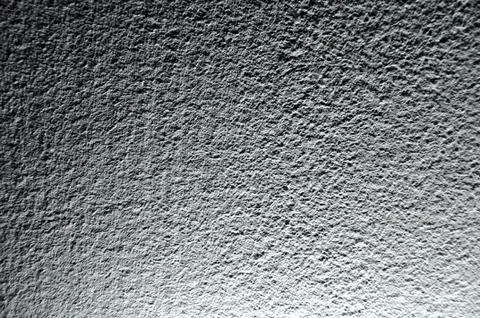 Close up of dark wall, structure with light Stock Photos