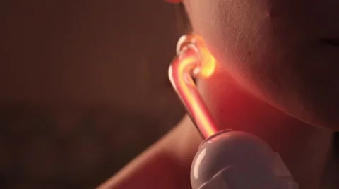 Close up of darsonvalization face of a girl with clay mask in beauty saloon Video stock 66657757