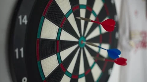 Close Up of Dartboard with Darts Thrown Stock Footage 344235851