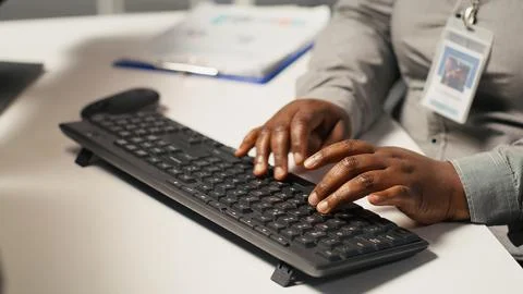 Close up of data center admin coding on PC, typing on computer keyboard Stock Photos