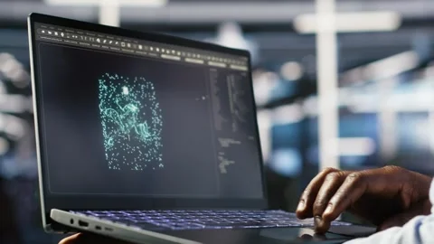 Close up of data center admin using machine learning algorithms on laptop Stock Footage 309125497