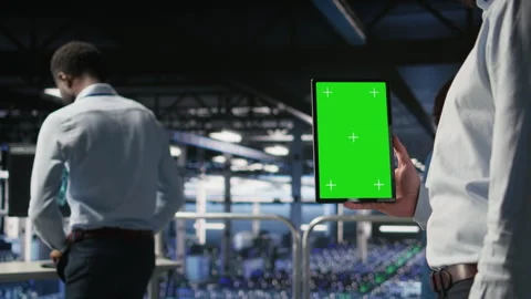 Close up of data center admin using mockup tablet to update software Stock Footage 310276102