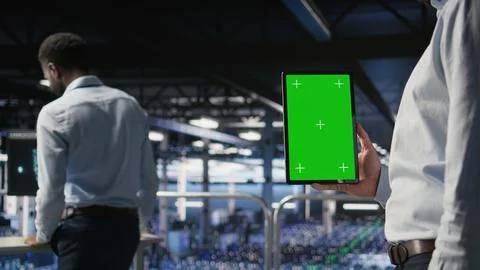 Close up of data center admin using mockup tablet to update software 스톡 사진