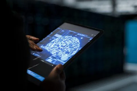 Close up of data center admin using AI assistant to install equipment 스톡 사진