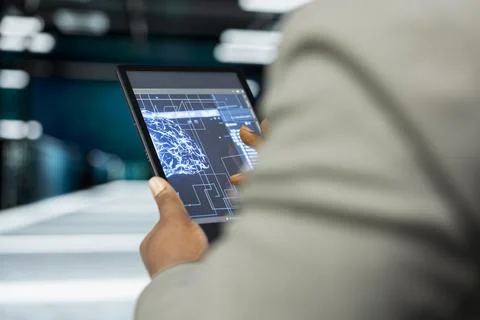 Close up of data center developer using AI software on tablet Stockfoto's