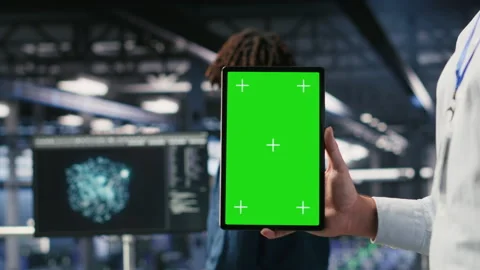 Close up of data center employee doing tasks on isolated screen tablet Stock Footage 310276238