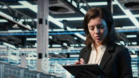 Close up of data center engineer optimizing server load balancing using tablet Stock Footage 330100796