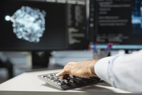 Close up of data center engineer using AI visualization tools on PC Fotos de archivo