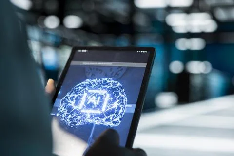 Close up of data center engineer using artificial intelligence on tablet Stock Photos