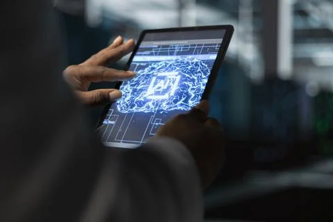 Close up of data center programmer using artificial intelligence on tablet Foto stock