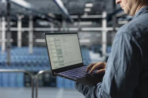 Close up of data center software developer resolving hardware bugs Stock Photos