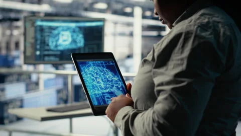 Close up of data center system administrators deploying deep learning software Stock Footage 314686327