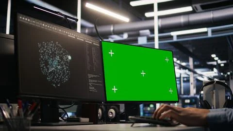 Close up of data center technician using green screen PC Stock Photos