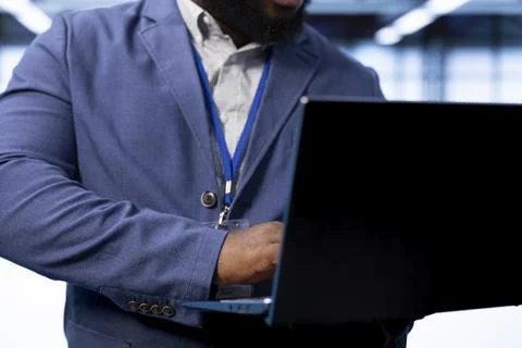 Close up of data center worker identifying and resolving technical issues Stock Photos