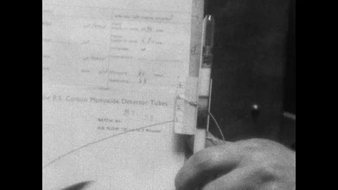 Close up of data from samples and graphs on paper, United Kingdom, 1945 Stock Footage 133387019