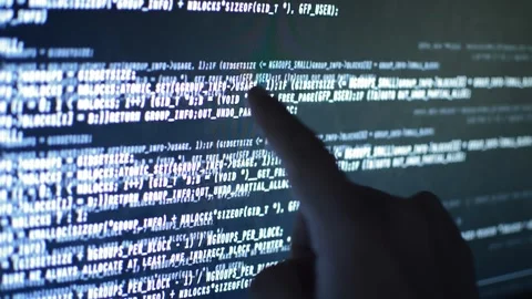 Close-up data web developer analyzing code on his computer Stock Footage 200118028