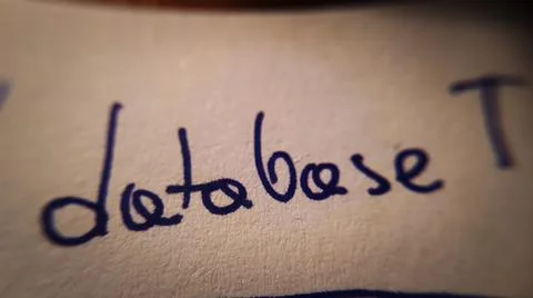 Close-Up database word on sheet of paper. Macro photo. 스톡 사진