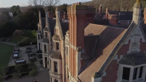 Close up of date carving AD 1897 on side of Victorian mansion Wood Norton Hall Stock Footage 284249438