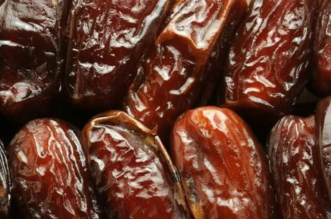 Close up on dates background Stock Photos