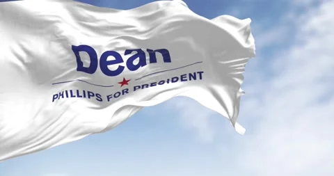 Close-up of Dean Phillips election campaign flag waving on a clear day Stock Footage 257696316