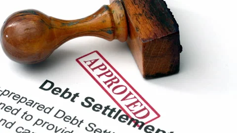 Close up of debt settlement approved Stock Footage 344477605