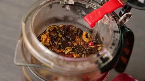 Close-up of a decanter with brewed tea and cinnamon sticks. Relax in the Video stock 150053966