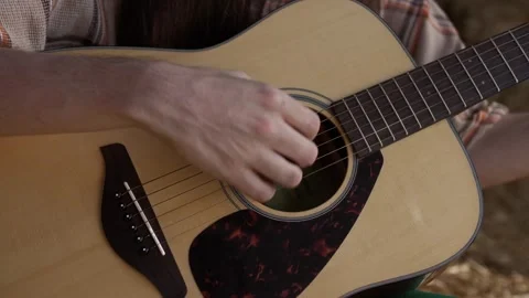 Close-up of the deck and resonator of a classical guitar played by a musician Stock Footage 264511750