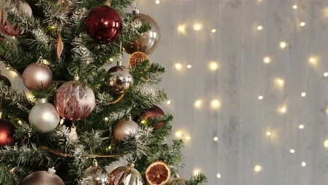 Close up of decorated christmas tree, copy space over festive lights background Stock Footage 185943206