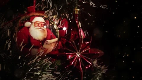 Close up of decorated Christmas tree at night, blurry lights, gold stars Video stock 82550353
