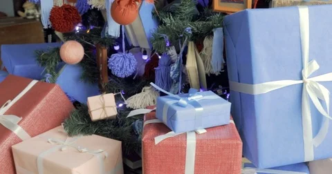 Close up of decorated Christmas tree with wrapped presents Stock Footage 81619495