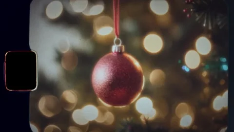 Close-up of decorating Christmas tree with balls shot on 8mm film Stock Footage 291276308