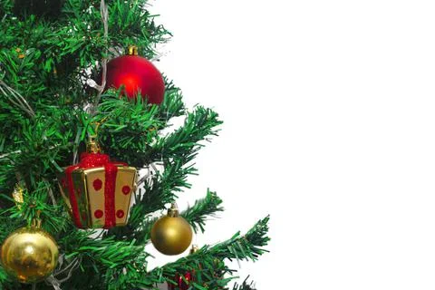 Close up of decorations on a Christmas tree. Selective focus and white backgr Stock Photos