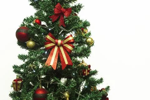 Close up of decorations on a Christmas tree with white background Stock Photos