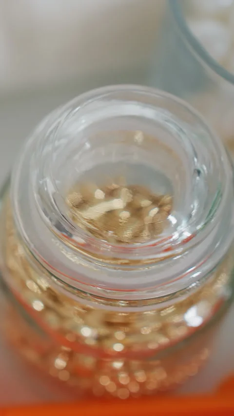 Close-Up of Decorative Beads and Sugar in Glass Cup for Baking and Desserts Stock Footage 320337322