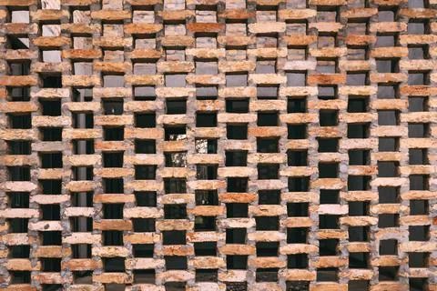 Close-up of decorative brickwork with staggered pattern and natural stone t.. Stock Photos