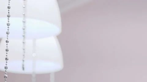 Close-up of decorative chains on lamps. Interior Design. lamp lighting Stock Footage 86390475