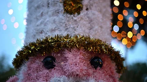 Close up of a decorative Christmas nutcracker soldier figure displayed outdoors Stock Footage 325800792