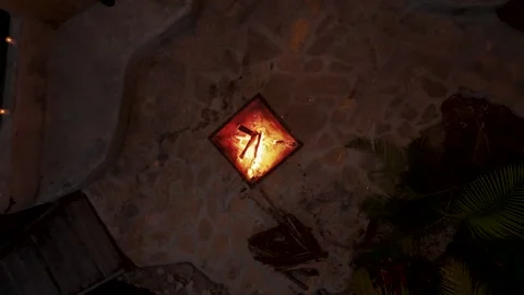 Close-up of a decorative flame burning in a stone vessel at a Peten, Guatemala Stock Footage 336526512